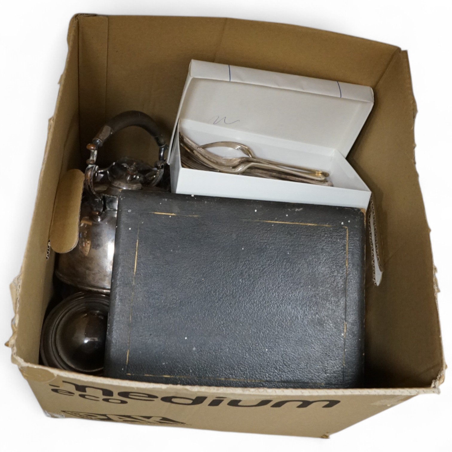 A group of assorted plated wares including an Old Sheffield plated tankard, tea kettle, teapot, flatware etc.